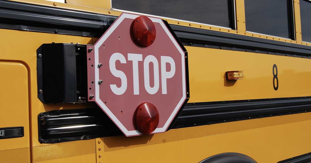 Stop sign on bus
